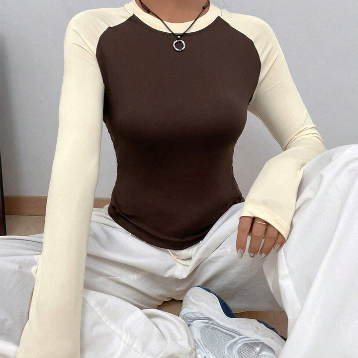 Chemisier à manches longues pour femmes avec un design raglan à la mode et une coupe ajustée Levoire