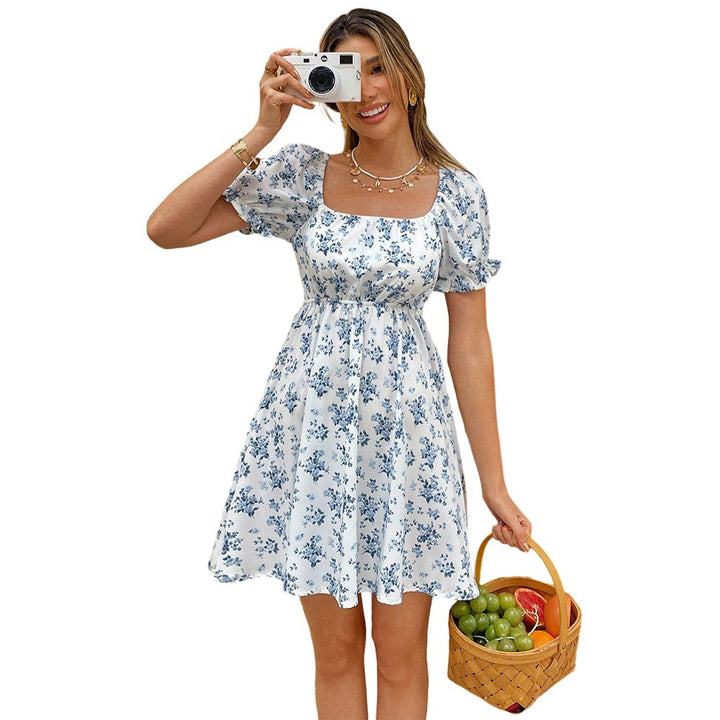 Robe d'été florale pour femmes avec décolleté chic au dos et manches bouffantes Levoire