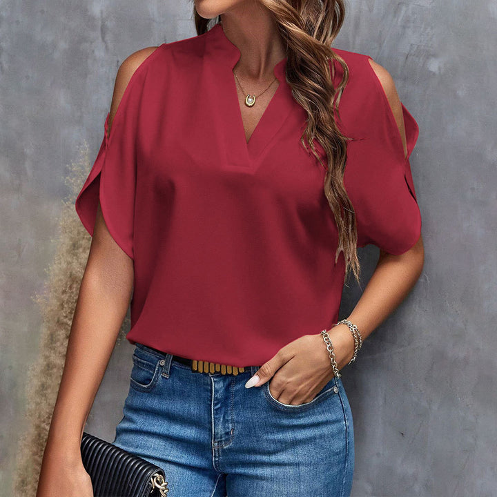 Blouse élégante pour femmes avec design de manches découpées et col montant à la mode Levoire
