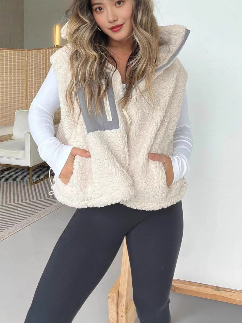 Gilet en polaire matelassé pour femmes avec fermeture éclair pratique et poches en fausse fourrure Levoire