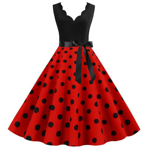 Robe swing femme avec un design moderne à pois et un élégant col en V Levoire
