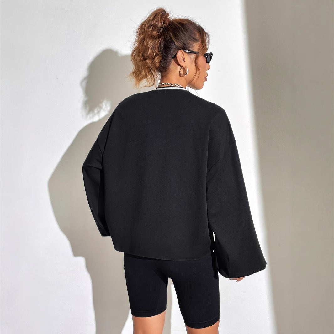 Sweat-shirt décontracté oversize pour femmes avec décolleté en V et imprimé graphique Levoire