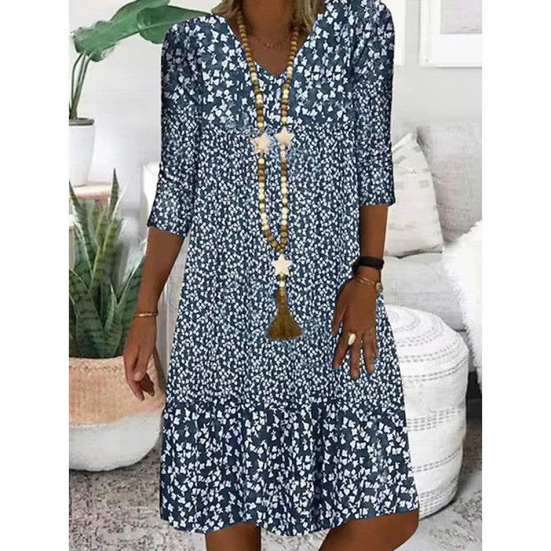 Levoire | Robe midi à col en V avec manches trois quarts à imprimé élégant