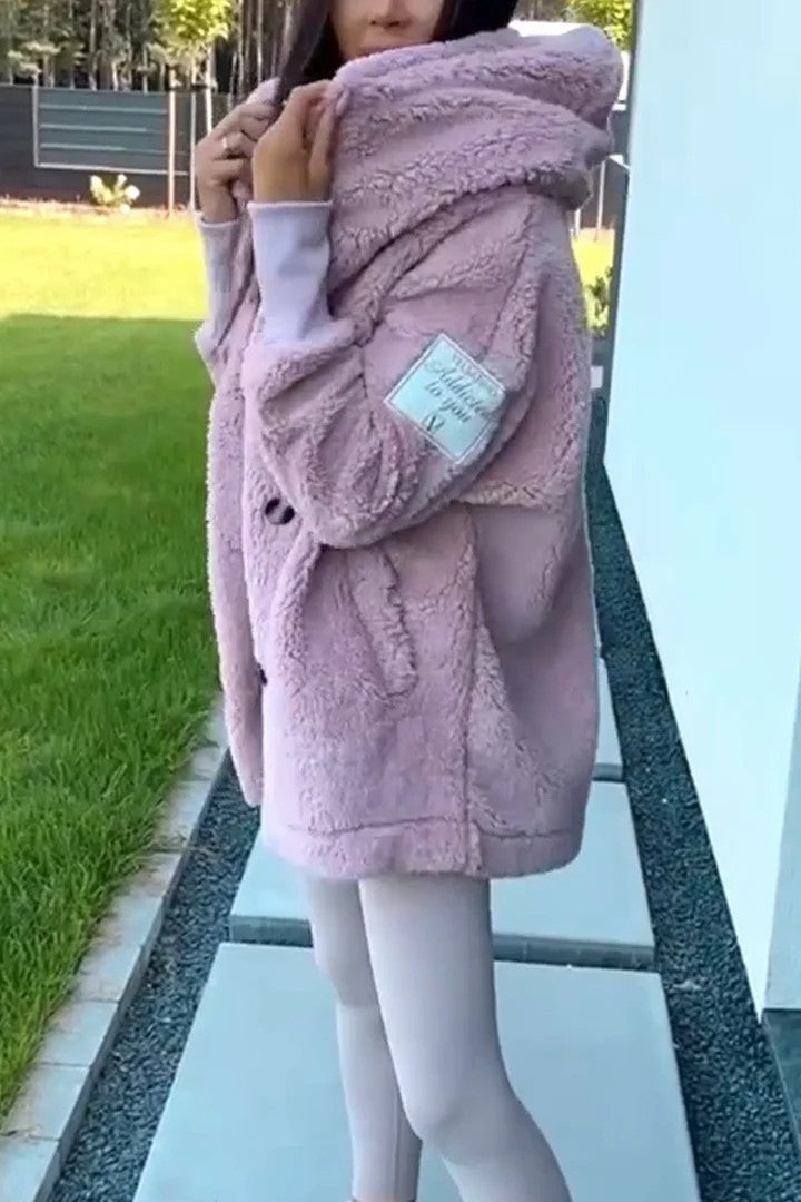 Veste en fourrure teddy pour femmes avec col classique et poches pratiques Levoire