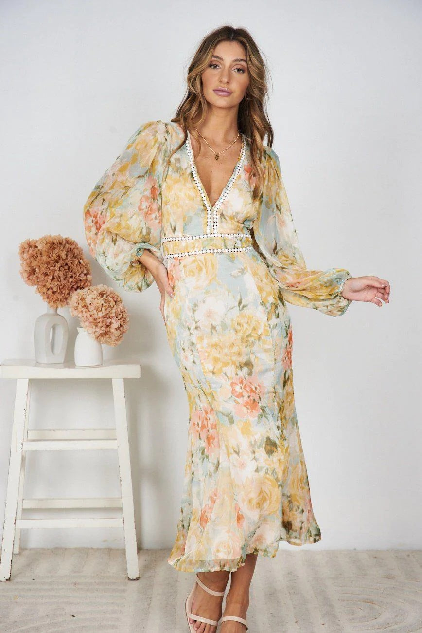 Robe maxi femme avec des manches volumineuses et des détails décoratifs Levoire