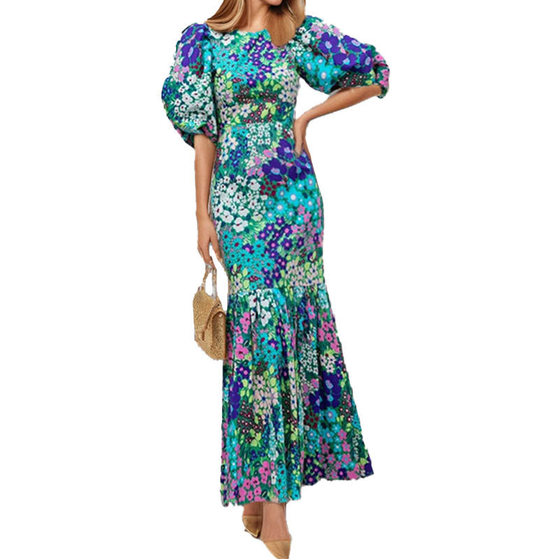 Robe maxi pour femmes avec des manches bouffantes volumineuses et des motifs floraux Levoire