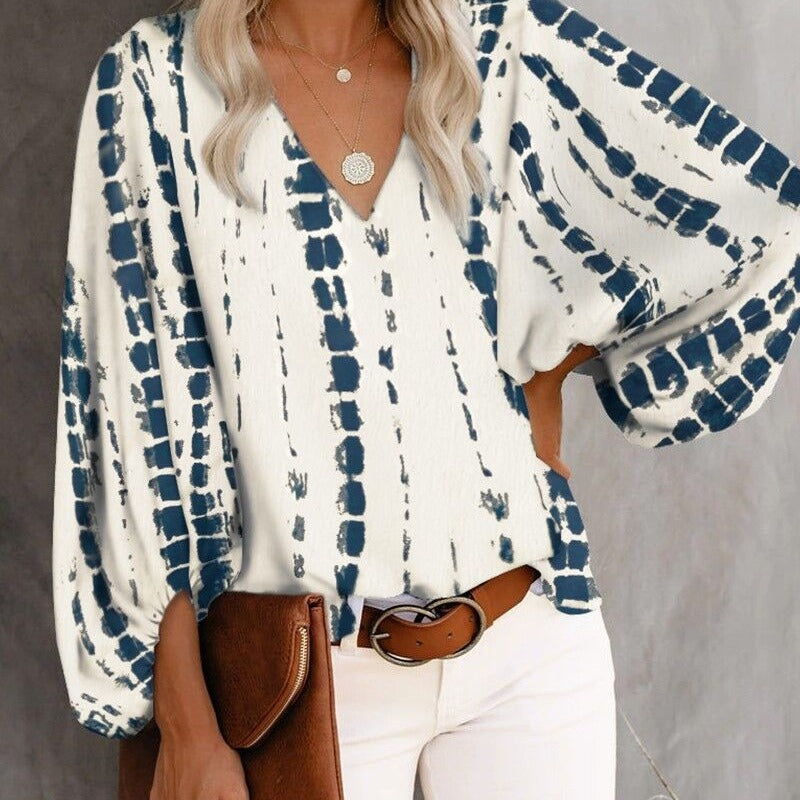 Blouse féminine à la mode avec des manches larges et un col en V Levoire