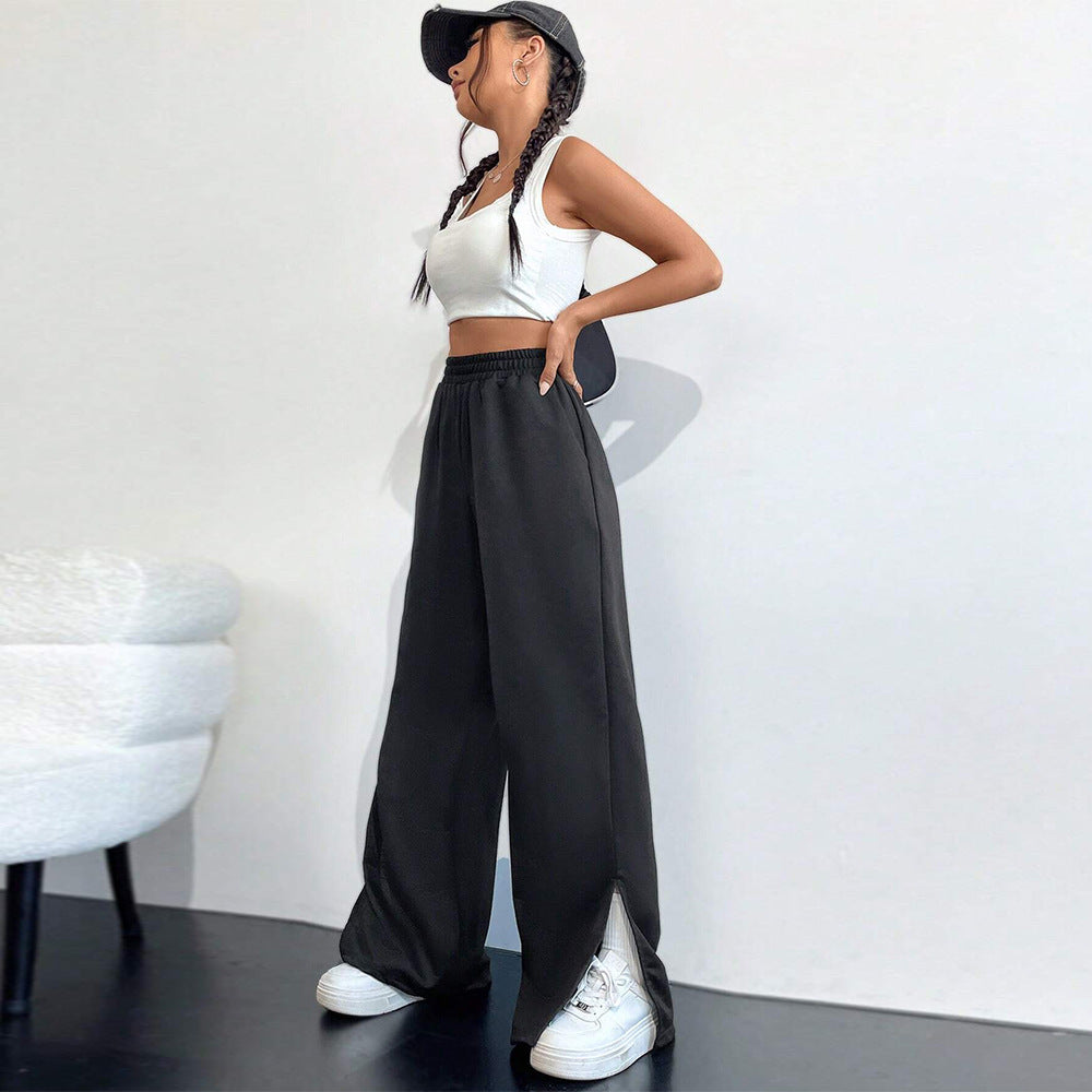 Pantalons satinés larges pour femmes avec taille élastique et fentes latérales Levoire