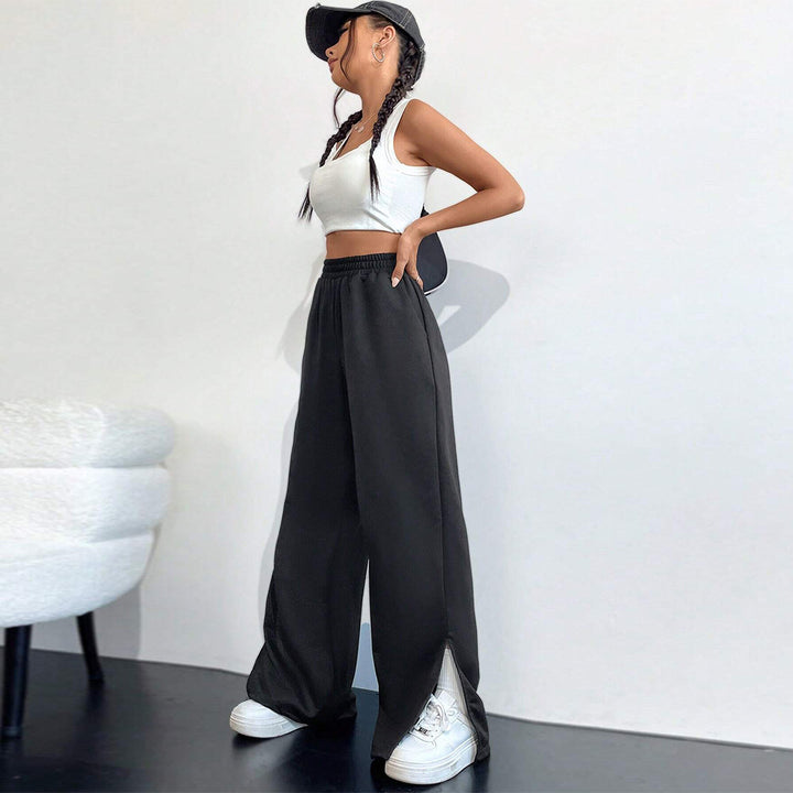 Pantalons satinés larges pour femmes avec taille élastique et fentes latérales Levoire