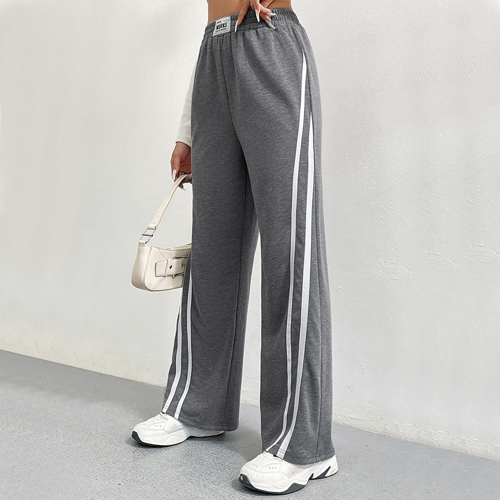 Pantalons de loisirs sportifs pour femmes avec coupe large et rayures contrastées Levoire
