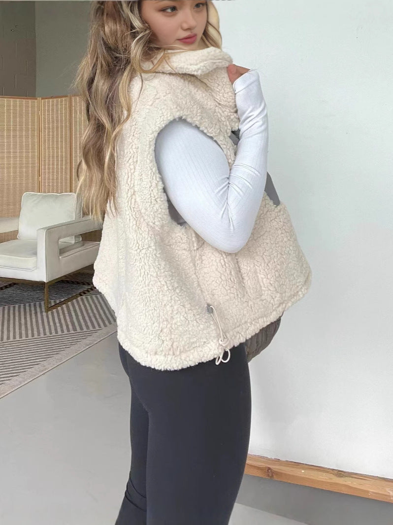 Gilet en polaire matelassé pour femmes avec fermeture éclair pratique et poches en fausse fourrure Levoire