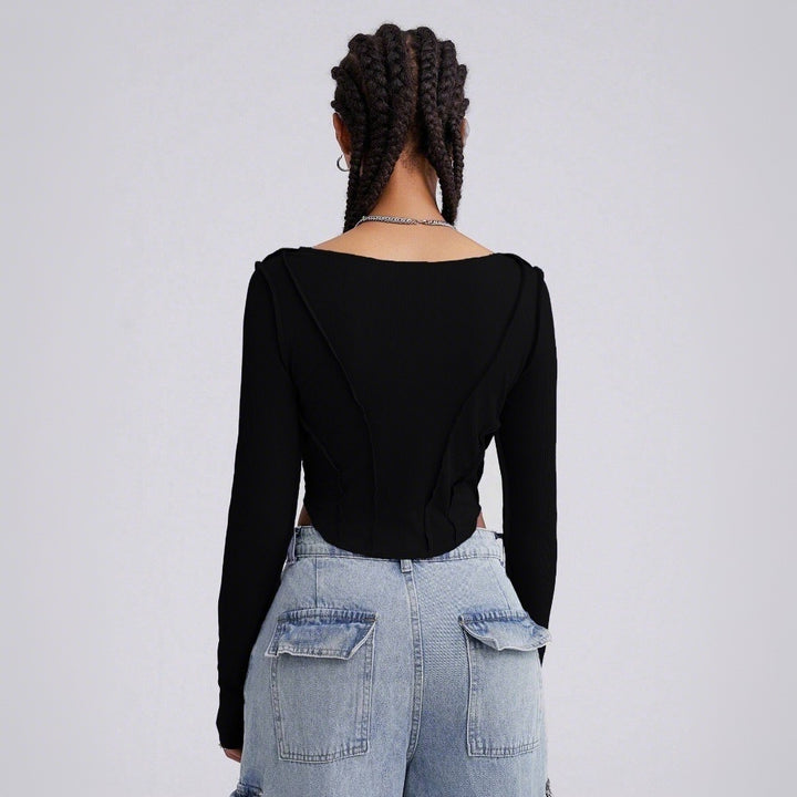 Body à manches longues pour femmes avec décolleté en V plongeant et détails découpés sophistiqués Levoire