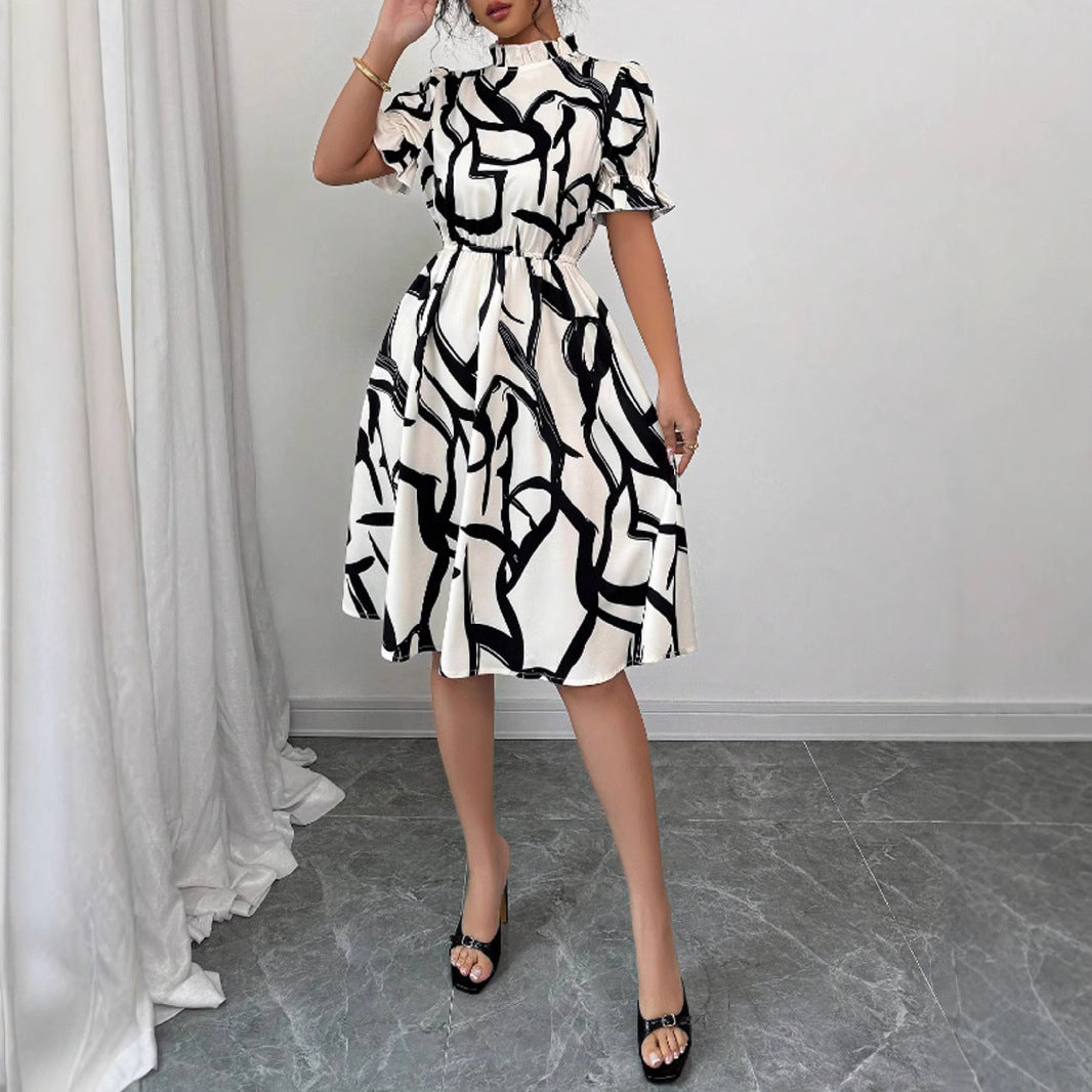 Robe midi élégante pour femmes avec motif de plantes stylé et taille élastique Levoire