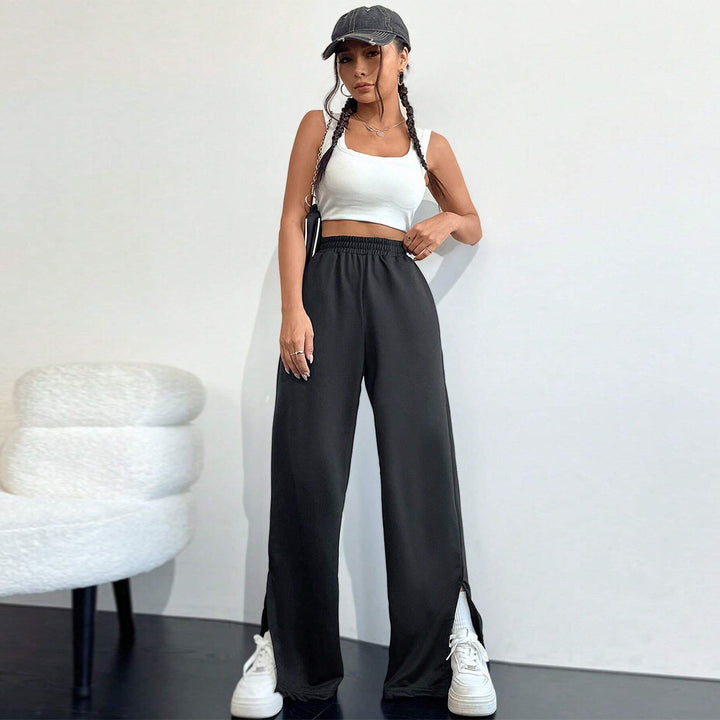 Pantalons satinés larges pour femmes avec taille élastique et fentes latérales Levoire