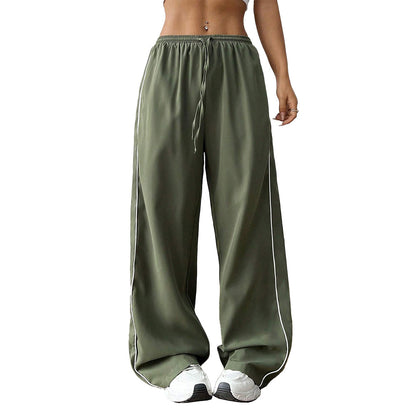 Pantalons de sport amples pour femmes avec taille élastique et bandes latérales élégantes Levoire
