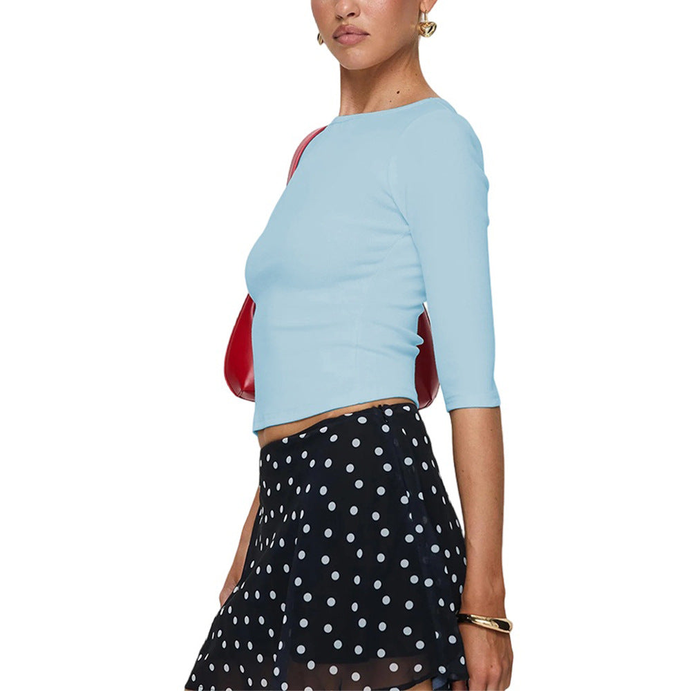 Chemise à manches longues cropped pour femmes avec un décolleté rond élégant et une coupe qui met en valeur la silhouette Levoire
