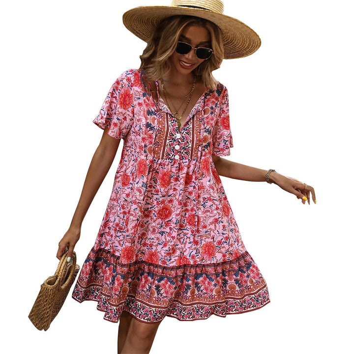 Robe d'été florale pour femmes avec ourlet à volants ludique et détail de boutons Levoire