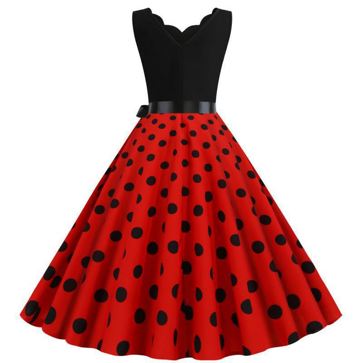 Robe swing femme avec un design moderne à pois et un élégant col en V Levoire