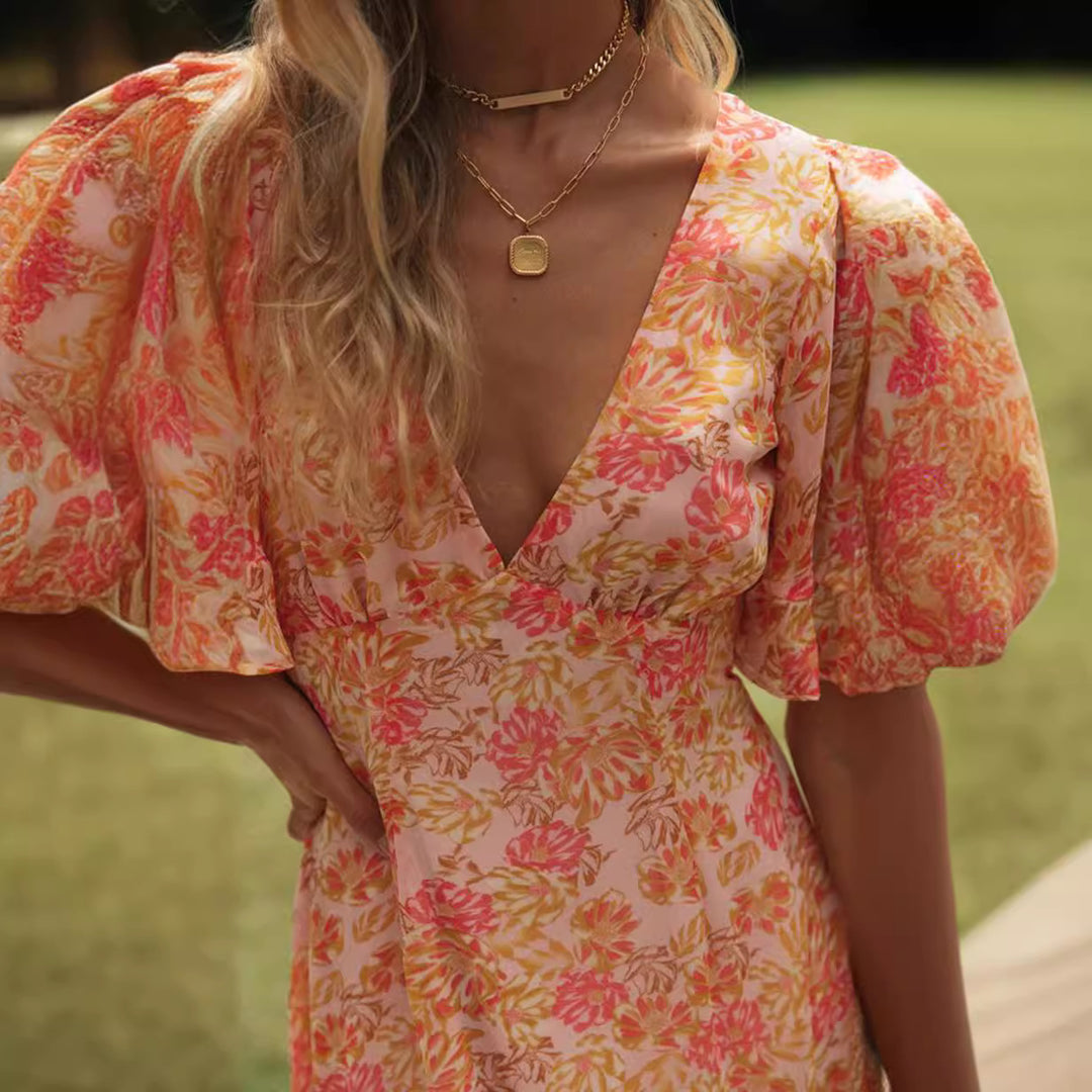 Robe portefeuille mini pour femme avec des manches volumineuses et découpe romantique au dos Levoire