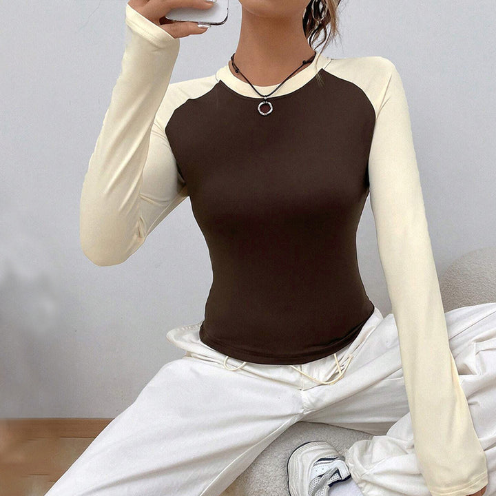 Chemisier à manches longues pour femmes avec un design raglan à la mode et une coupe ajustée Levoire