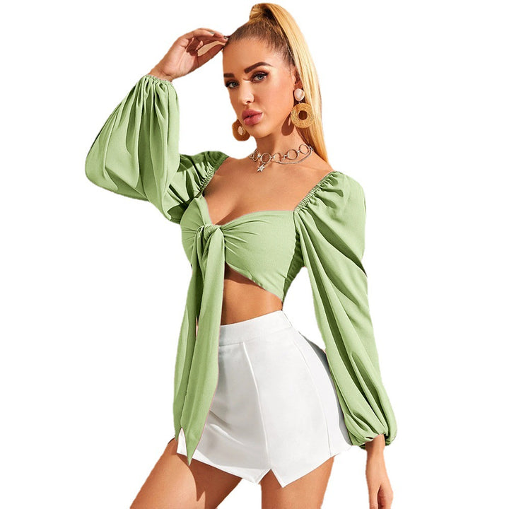 Blouse femme avec un design de nœud sophistiqué et des manches volumineuses Levoire