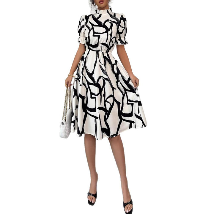 Robe midi élégante pour femmes avec motif de plantes stylé et taille élastique Levoire