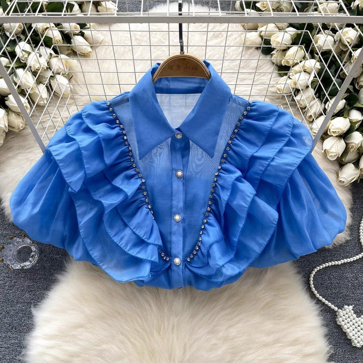 Levoire | Top avec des diamants transparents et fins et des manches bouffantes Bleu Taille libre