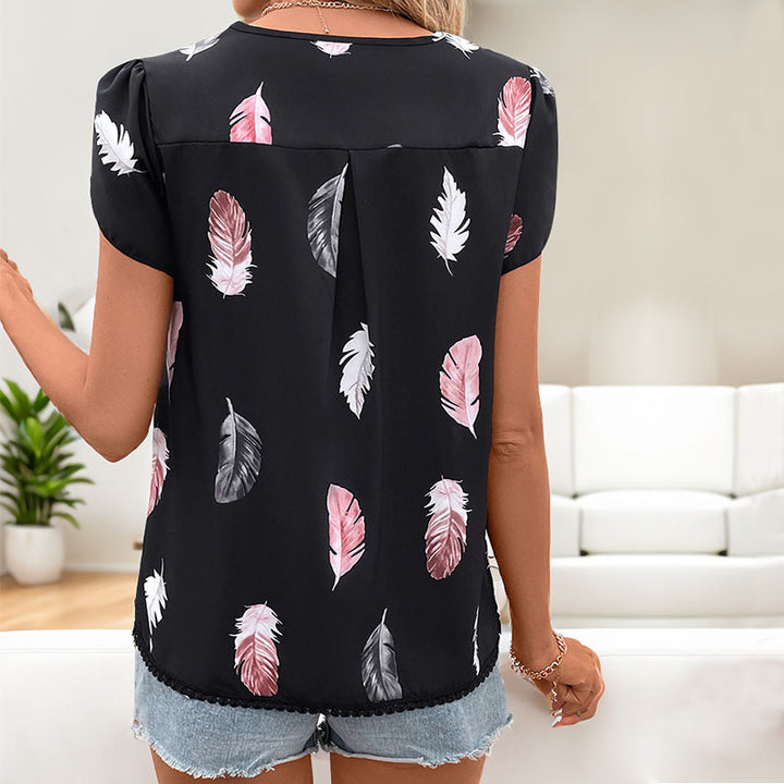 Haut féminin avec motif floral en feuilles et détails de boutons décoratifs Levoire