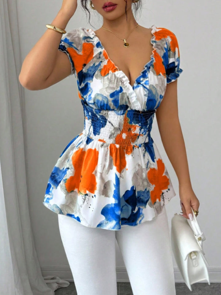 Blouse femme avec volants floraux et taille élastique Levoire