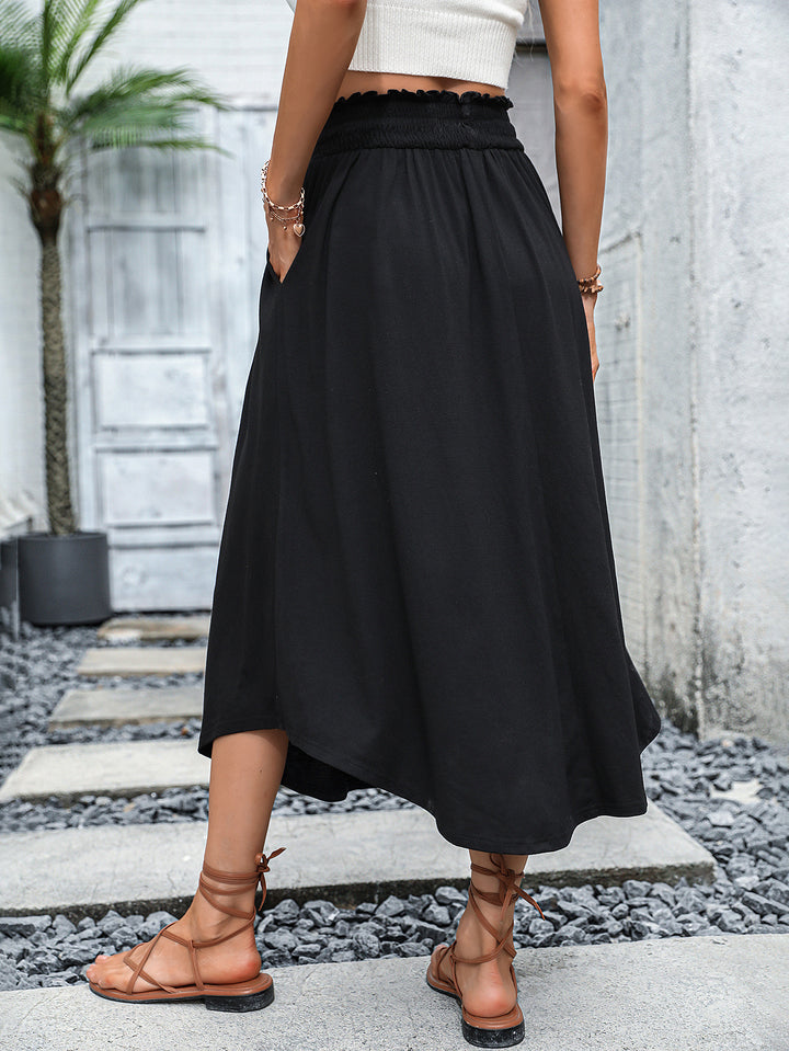 Jupe midi pour femmes avec taille élastique et poches latérales pratiques Levoire