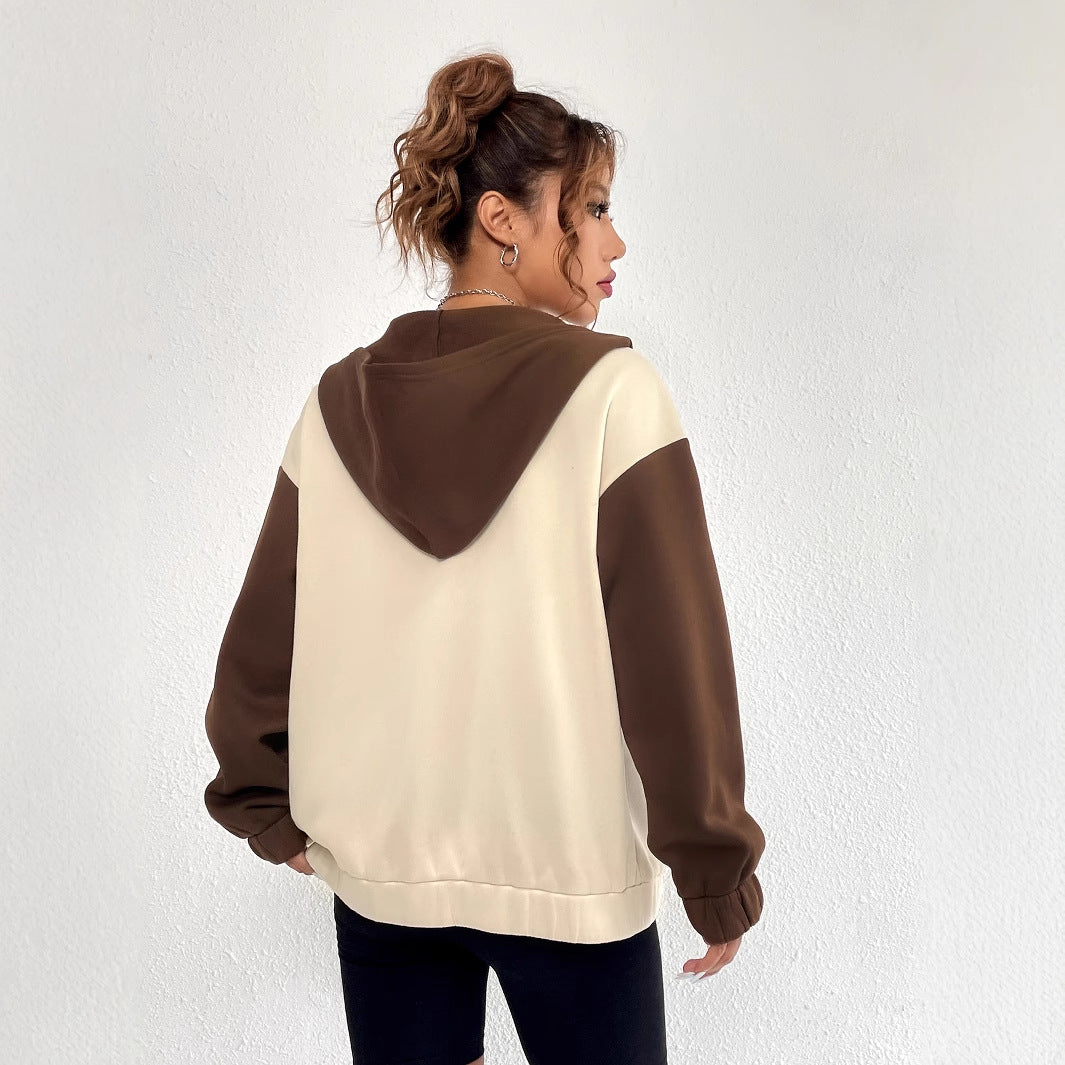 Veste sweatshirt décontractée pour femmes avec manches et capuche contrastantes Levoire