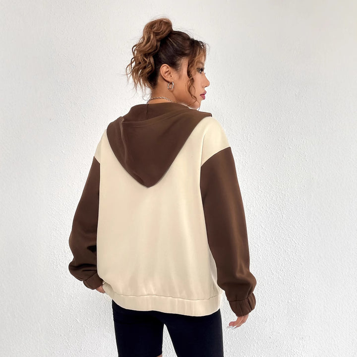 Veste sweatshirt décontractée pour femmes avec manches et capuche contrastantes Levoire
