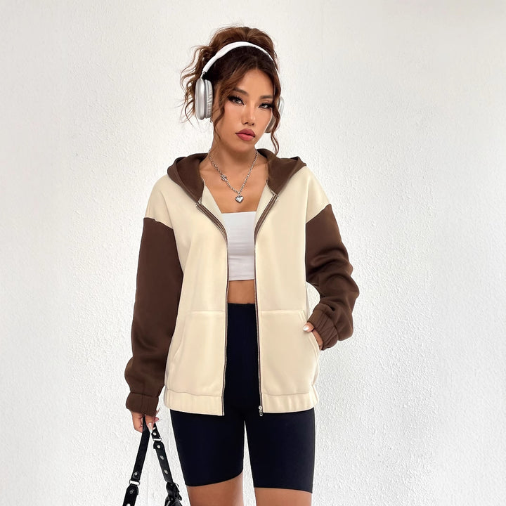 Veste sweatshirt décontractée pour femmes avec manches et capuche contrastantes Levoire