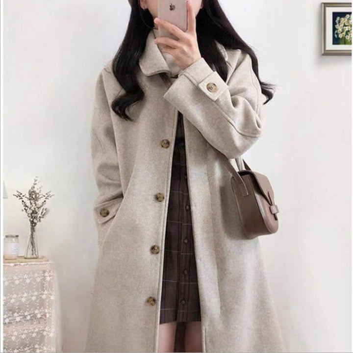 Manteau féminin élégant à coupe décontractée avec patte de boutonnage Levoire