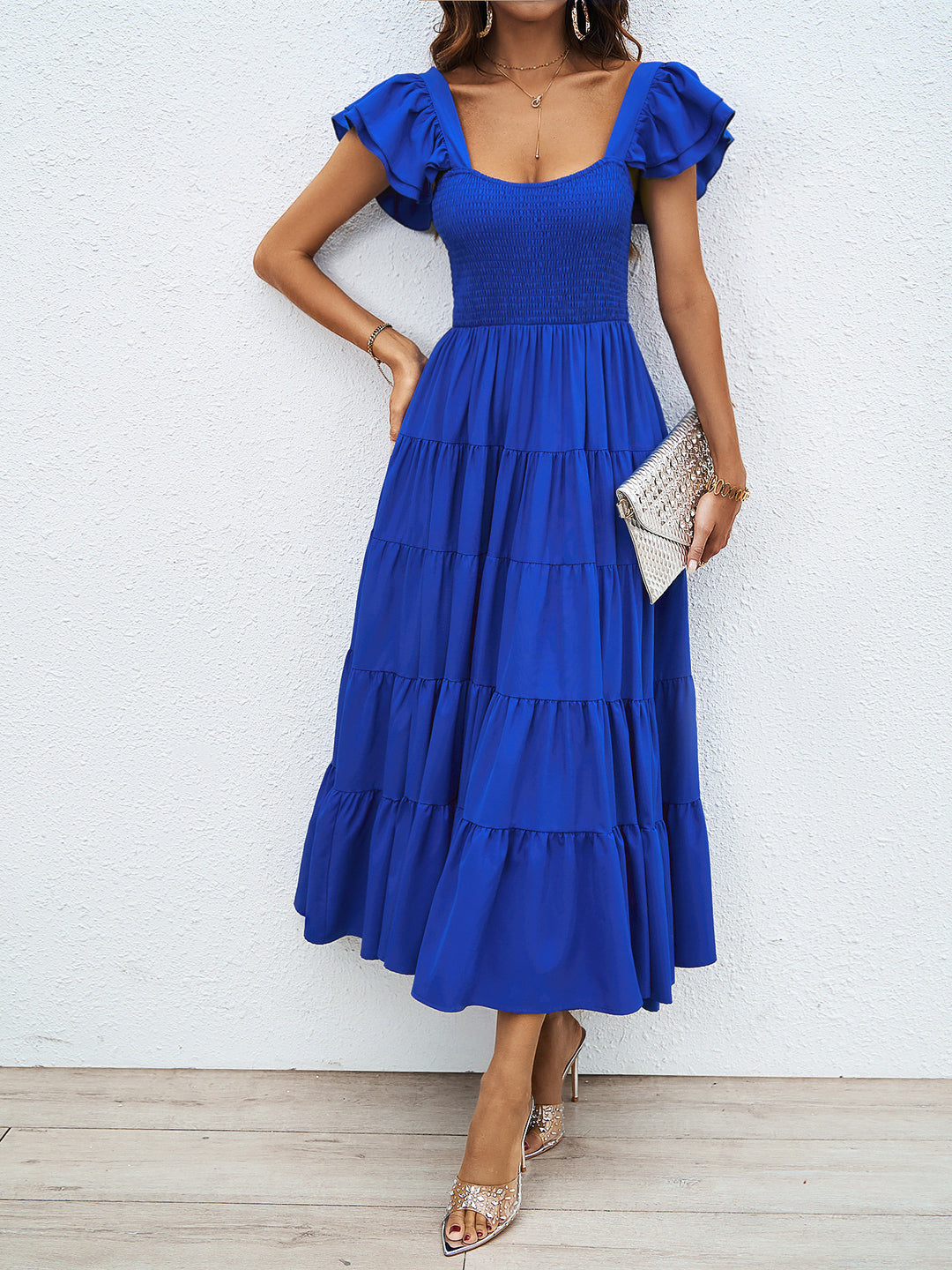 Robe maxi pour femmes avec des manches bouffantes volumineuses et un corps froncé Levoire
