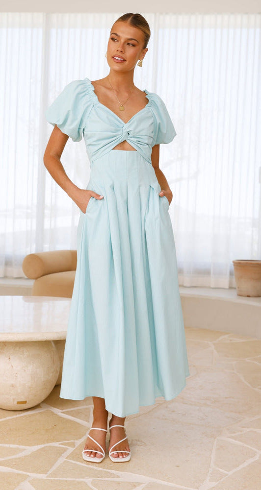 Robe midi femme avec un détail de nœud ludique et un design à manches bouffantes Levoire