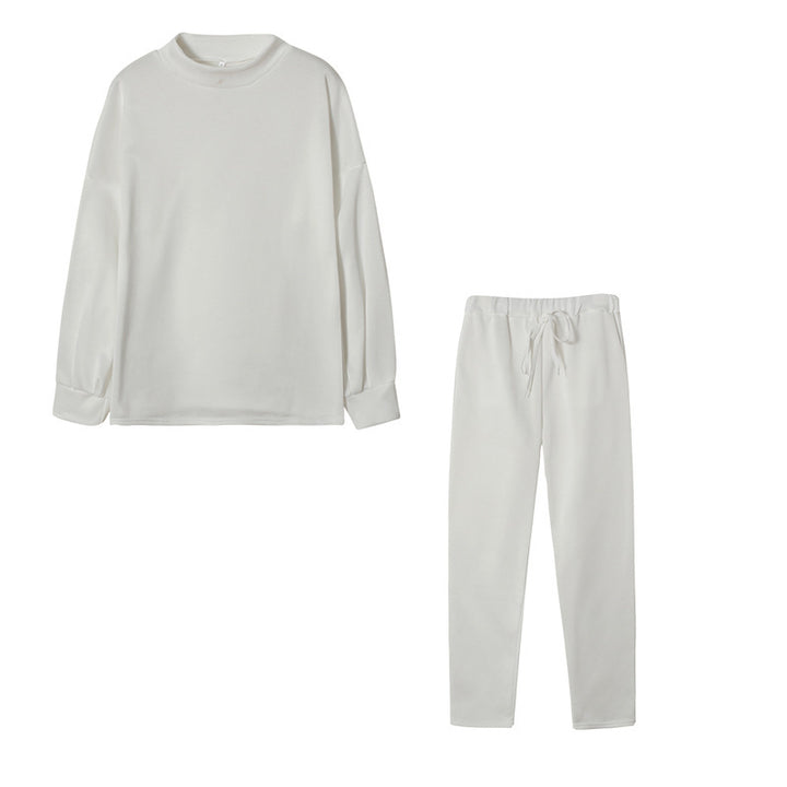Ensemble de survêtement pour femmes avec une coupe moderne, un haut à col montant et un pantalon élastique Levoire
