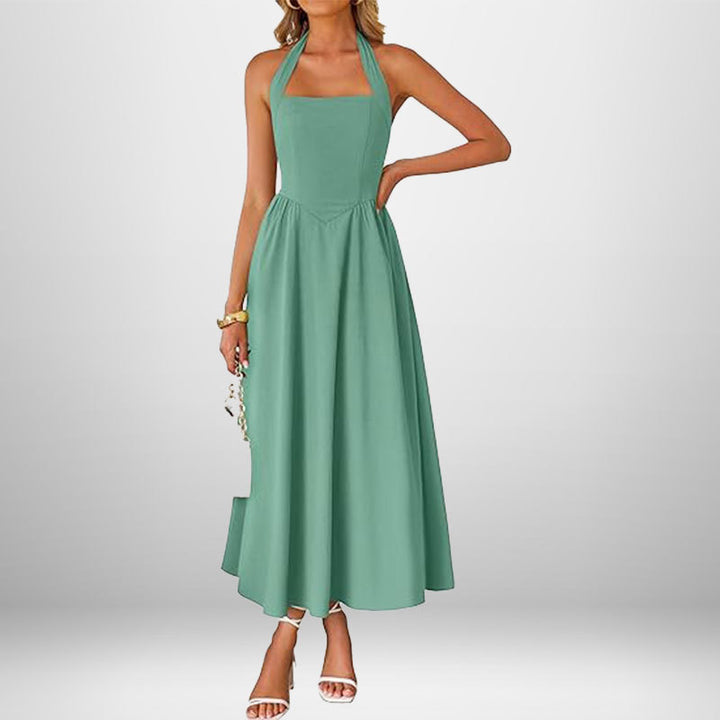 Robe maxi pour dames avec col halter décolleté et jupe fluide Levoire