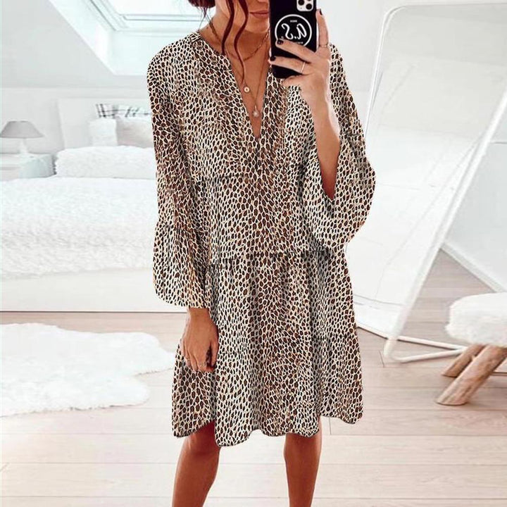 Robe maxi femme avec un élégant col en V et des manches volumineuses Levoire
