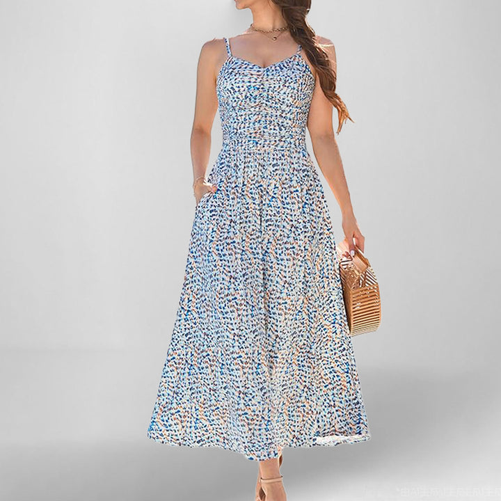 Robe maxi femme avec fines bretelles et poches latérales pratiques Levoire