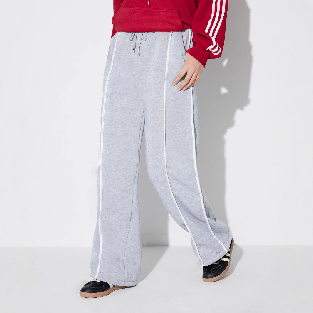 Pantalons d'entraînement décontractés pour femmes dans une coupe moderne avec une taille élastique et des inserts latéraux stylés Levoire