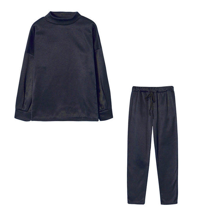Ensemble de survêtement pour femmes avec une coupe moderne, un haut à col montant et un pantalon élastique Levoire