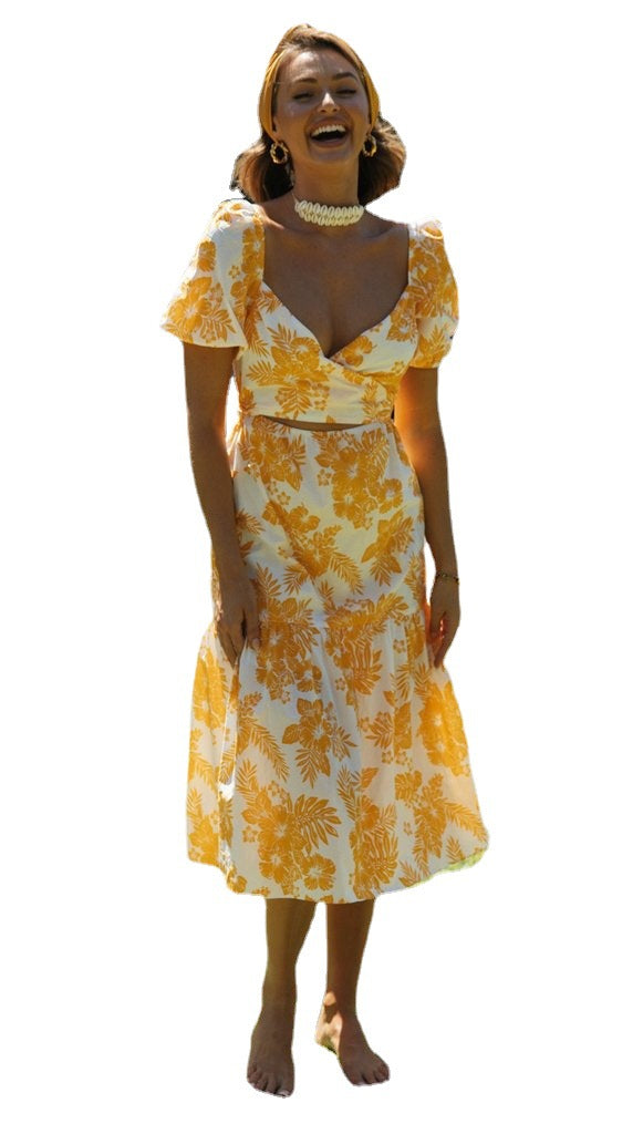 Robe midi femme avec décolleté en cascade et détails floraux Levoire