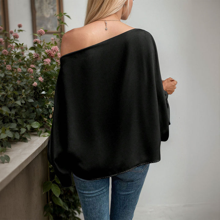 Haut long à manches asymétriques pour femmes avec un élégant drapé et un fin col en V Levoire