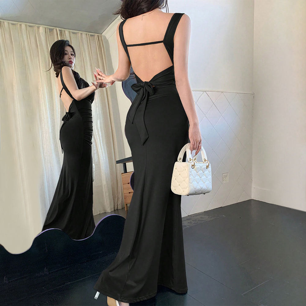 Robe de soirée élégante pour femmes avec découpes raffinées au dos et ceinture décorative à nouer Levoire