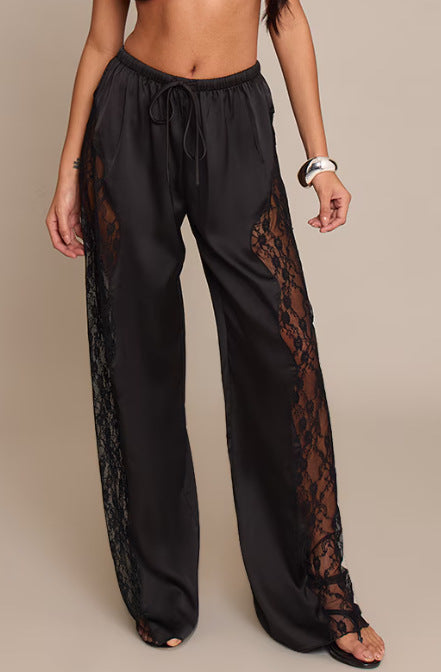 Pantalons en satin élégants pour femmes avec des inserts en dentelle et des découpes latérales Levoire