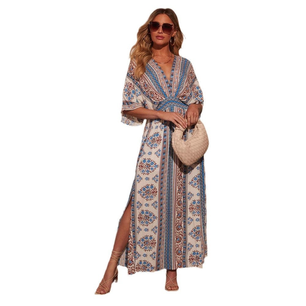 Robe maxi femme avec un élégant décolleté en V, fente sur le côté et motif floral Levoire
