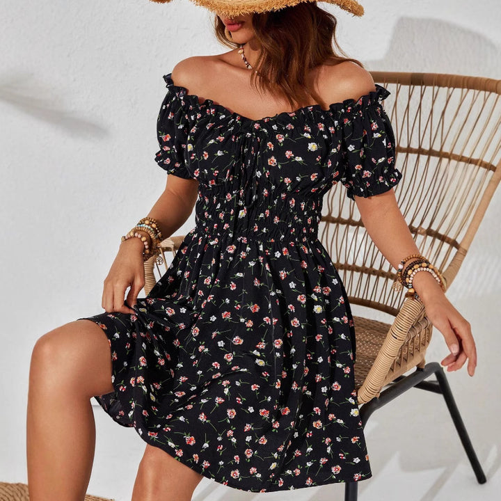 Robe d'été femme à épaules dénudées avec motif floral et éléments volants Levoire