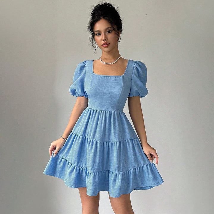 Robe pour femmes avec des manches bouffantes et un ourlet à volants Levoire