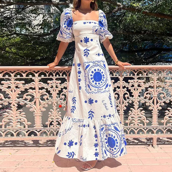 Robe maxi femme avec manches bouffantes et détails imprimés floraux Levoire